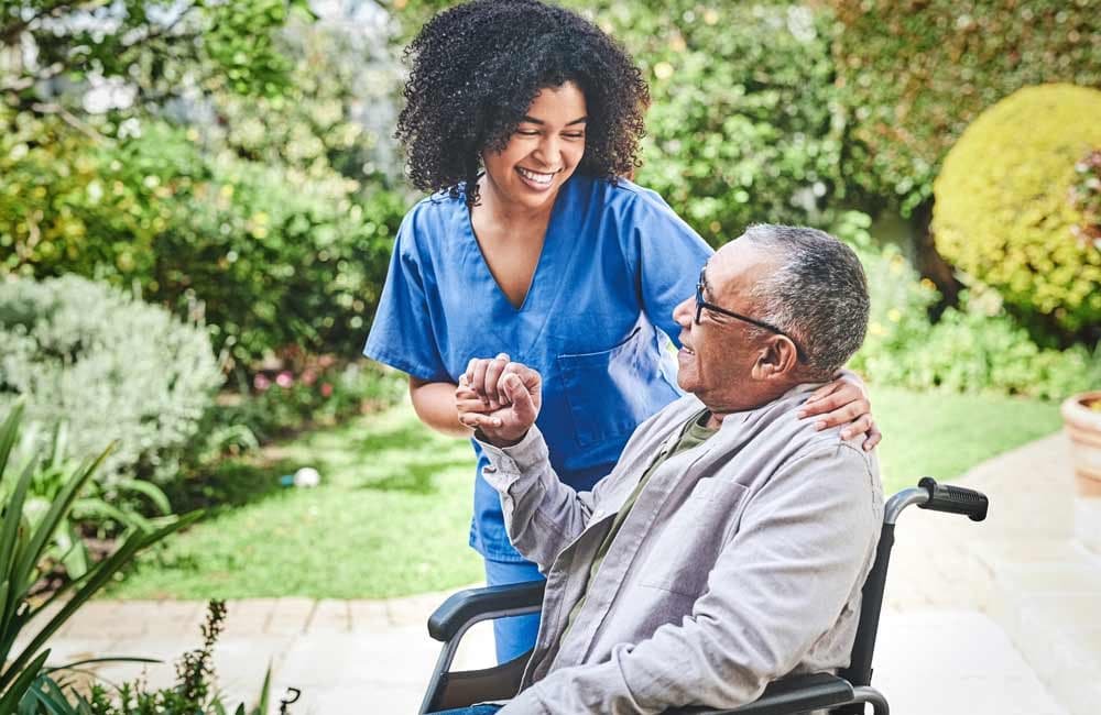 Adult caregiver assisting an aging family member in Minnetonka