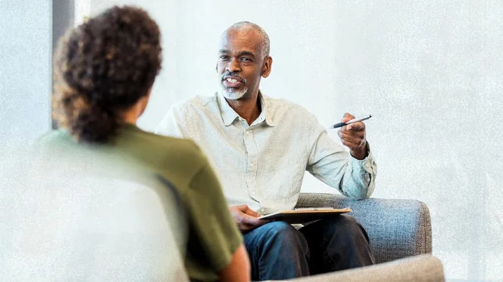Mental health clinician discussing mood changes and support options.webp